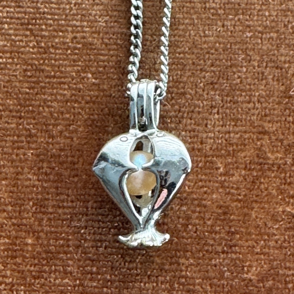 2 dolphin Silver Pendant Necklace with real pearl inside.